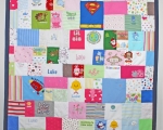 quilt made out of baby clothes