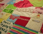 make a quilt out of baby clothes