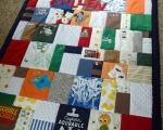 patchwork quilt from baby clothes