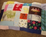 quilt made from baby clothes