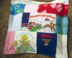 quilt made from baby clothes