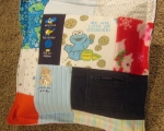 quilt made from baby clothes