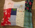 quilt made from baby clothes