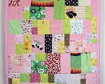 quilt made from old baby clothes