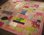 quilt made from baby clothes