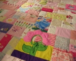 quilt made from baby clothes