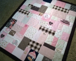 patchwork quilt from baby clothes