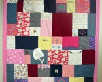 quilt made from baby clothes