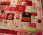 quilt made from old baby clothes