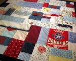 quilt made from baby clothes