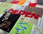 make a quilt out of baby clothes