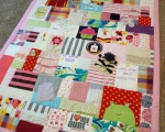 quilt made from baby clothes