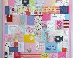 quilt made from old baby clothes